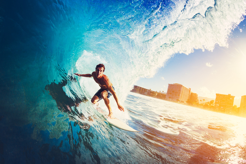 Man surfing on wave. 