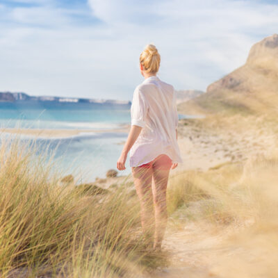 woman standing at beach 