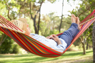 woman lying in hammock 