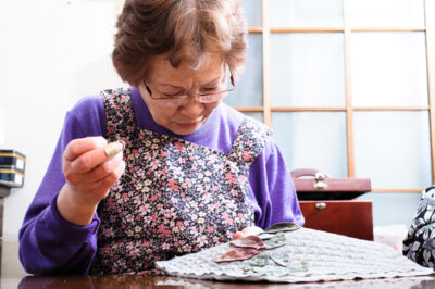 Woman using a pin and needle