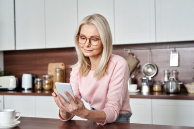 A woman scrolling on her phone